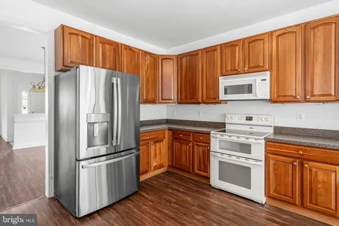 a living room with furniture fireplace and a flat screen tv