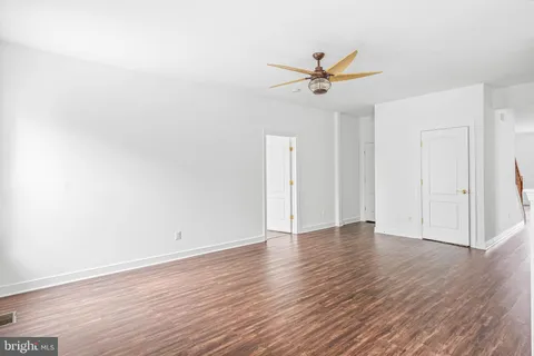a view of livingroom with hardwood floor and window