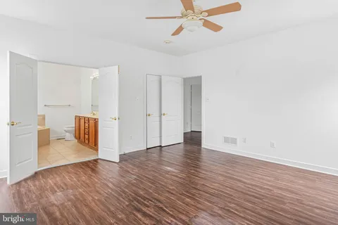 a bathroom with a shower and a sink