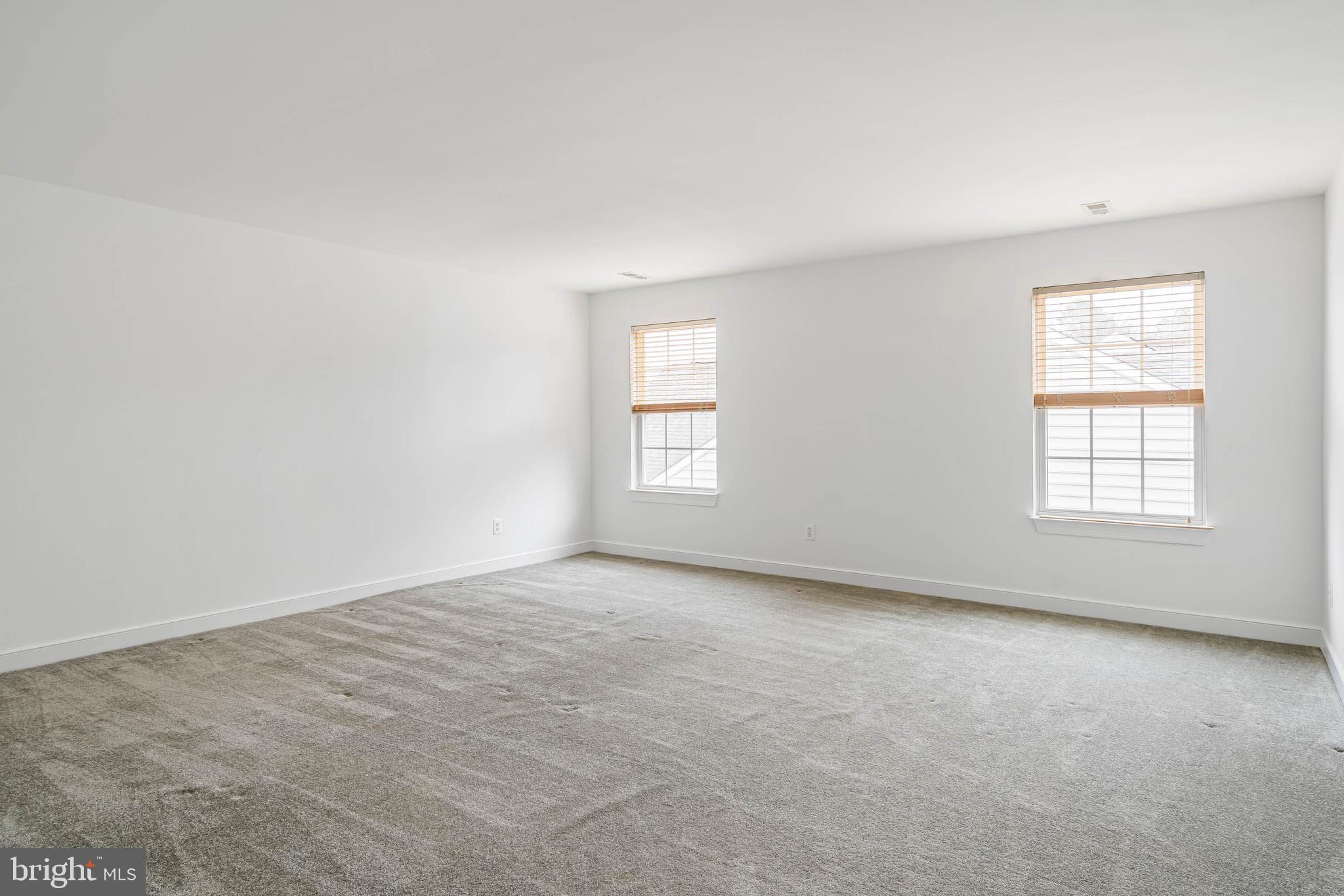 35560 Dry Brook Drive Rehoboth Beach, DE 19971 - Photo 45 of 63 an empty room with windows