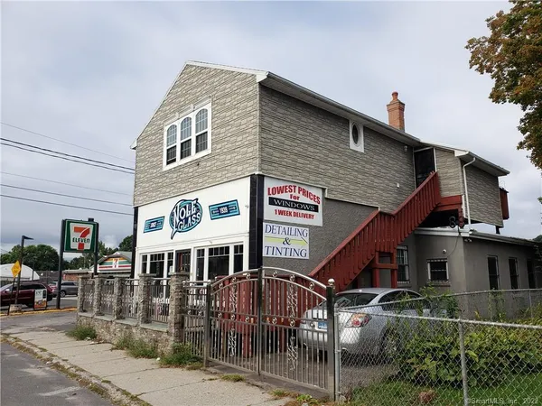 a front view of a house with garage