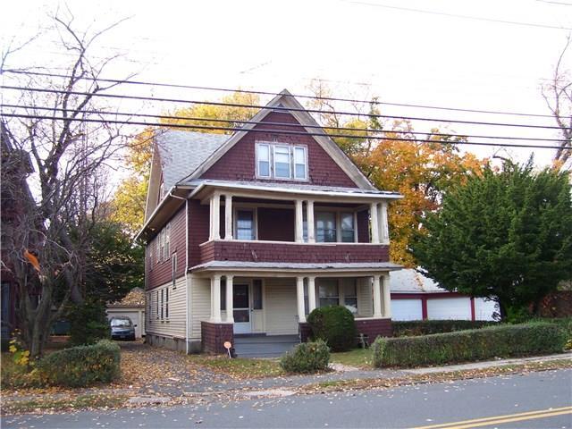 433 Ellsworth Street Bridgeport, CT 06605 - Photo 1 of 1 a front view of a house with a yard