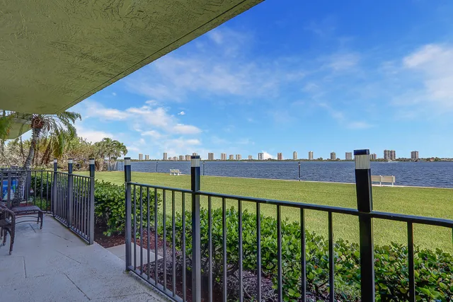 a view of a balcony with lake view and mountain view