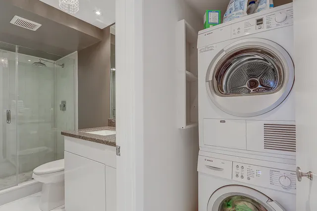 a view of a bathroom with a washer and dryer