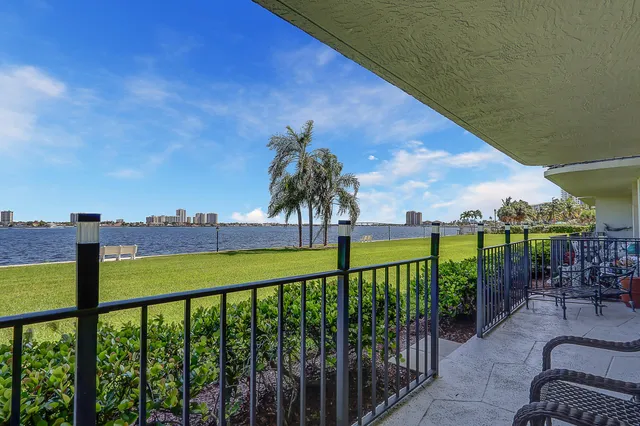a view of a balcony with lake view
