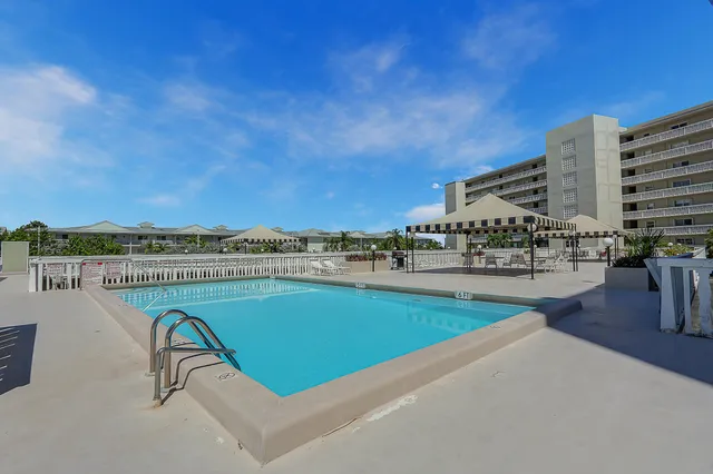 a view of a swimming pool and a terrace