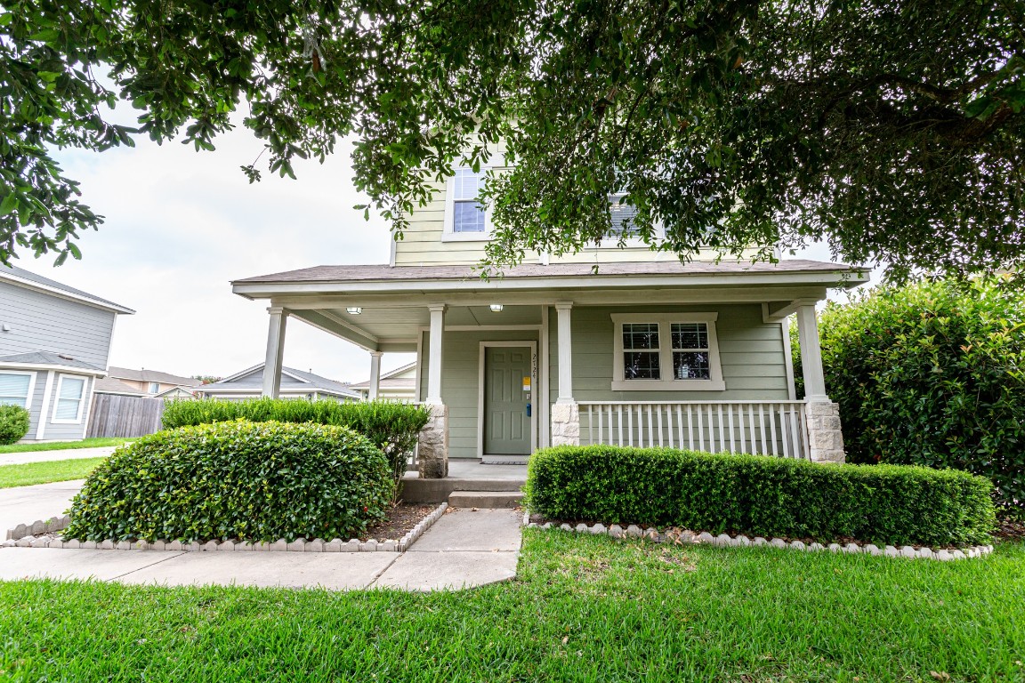 2724 Amberglow Court Round Rock, TX 78665 - Photo 2 of 18 a view of a house with a yard and plants