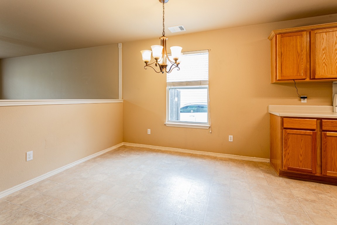 2724 Amberglow Court Round Rock, TX 78665 - Photo 6 of 18 a view of an empty room with window