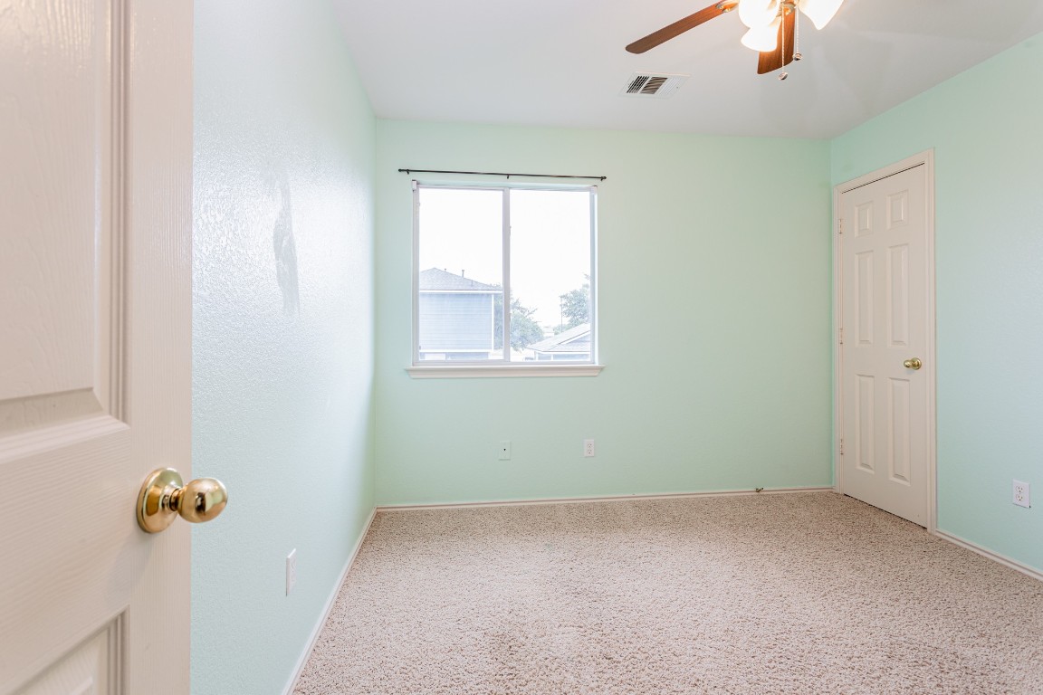 2724 Amberglow Court Round Rock, TX 78665 - Photo 9 of 18 an empty room with a window