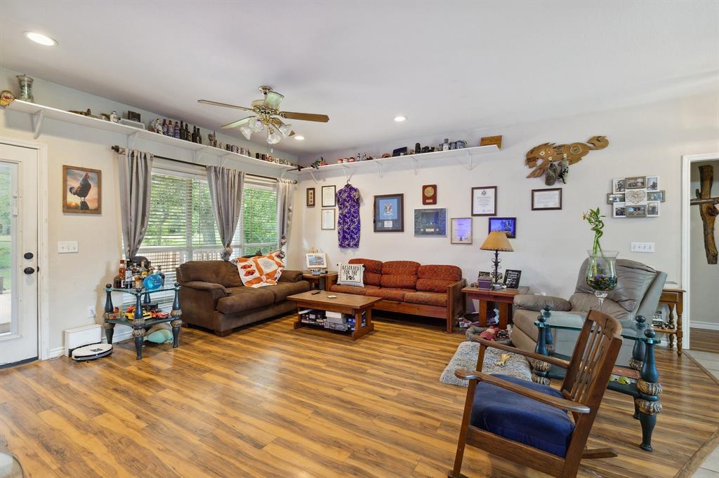118 Cagle Quinlan, TX 75474 - Photo 8 of 23 a living room with furniture and wooden floor