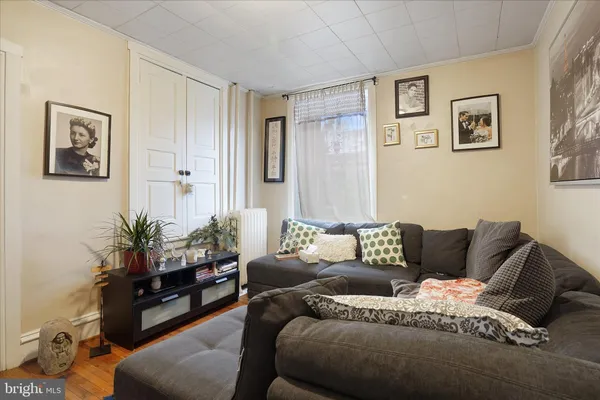 a living room with furniture rug and couch