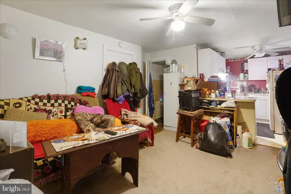 a bedroom with furniture and a bed