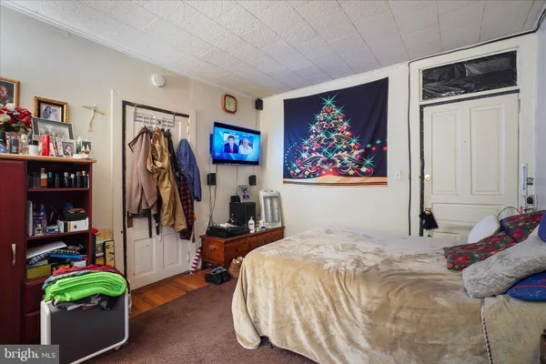 a view of outdoor space with wooden floor and seating space