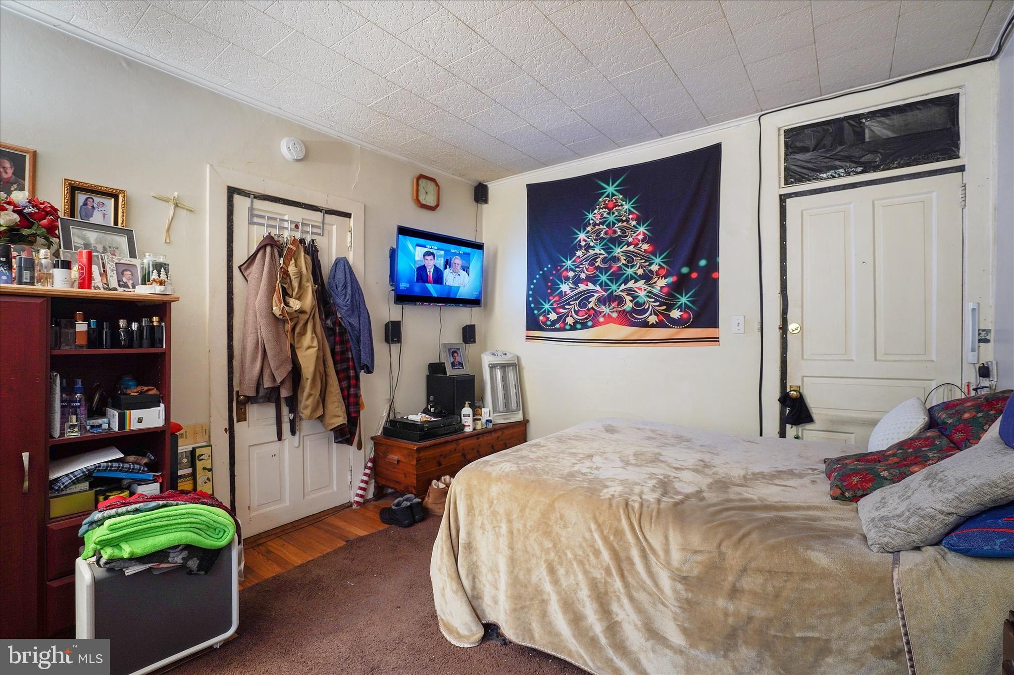 300 Friedensburg Road Reading, PA 19606 - Photo 21 of 26 a bedroom with a bed and a painting on the wall