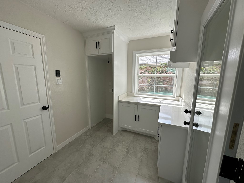 2507 Oak Circle Bryan, TX 77802 - Photo 14 of 34 a view of a bedroom with wooden floor and windows