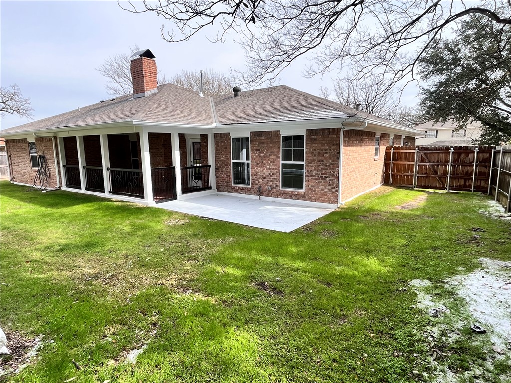 2507 Oak Circle Bryan, TX 77802 - Photo 29 of 34 a view of a house with a yard and sitting area
