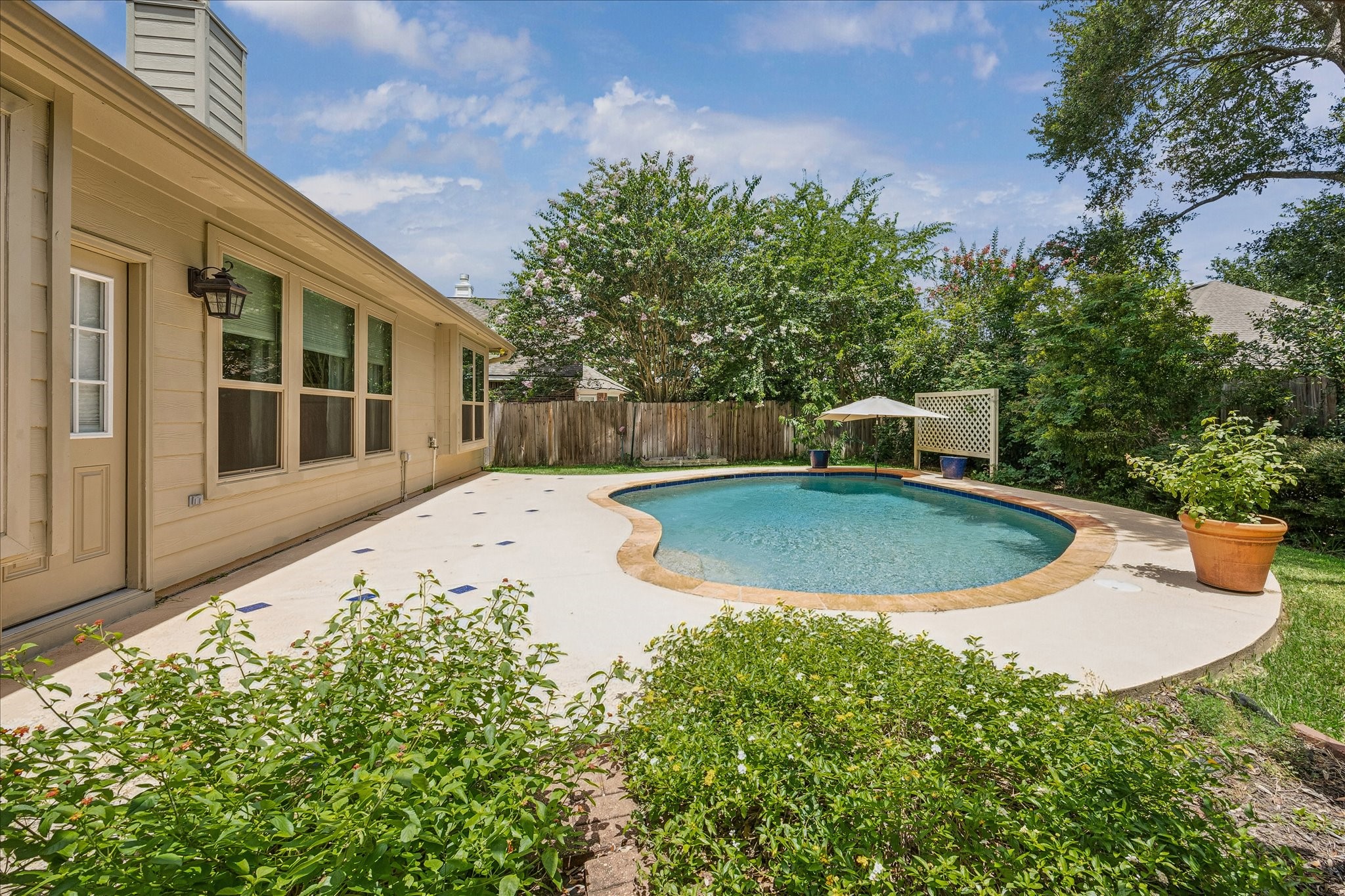 5811 Walkabout Way Katy, TX 77450 - Photo 30 of 33 Expansive pool deck offers plenty of room for entertaining, sunbathing, and enjoying Houston's outdoor lifestyle.