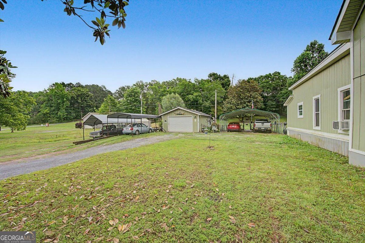 483 Coal Road Northwest Resaca, GA 30735 - Photo 40 of 56 a house view with a garden space