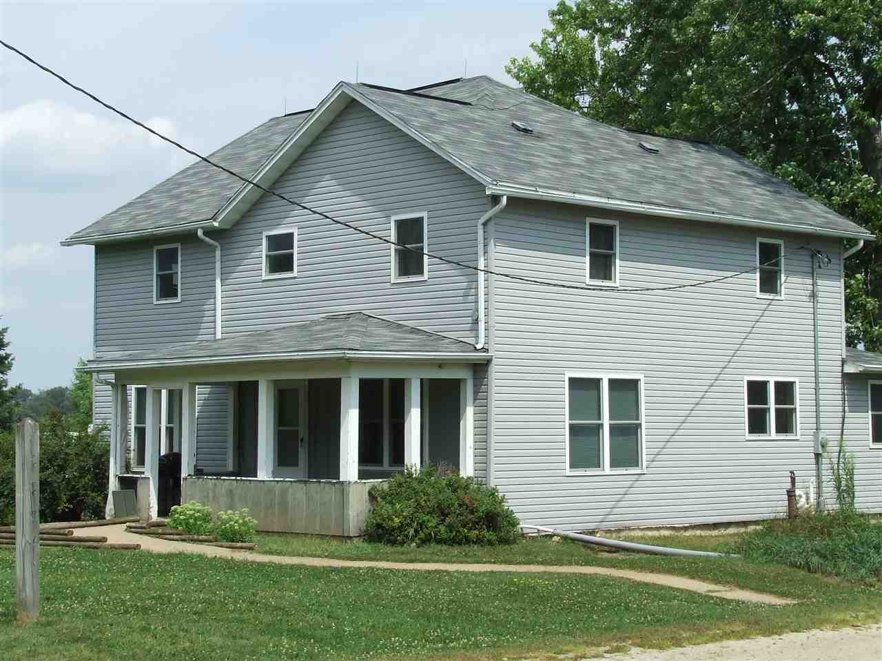 8765 North Lake Road Lena, IL 61048 - Photo 12 of 12 a view of a house with a yard