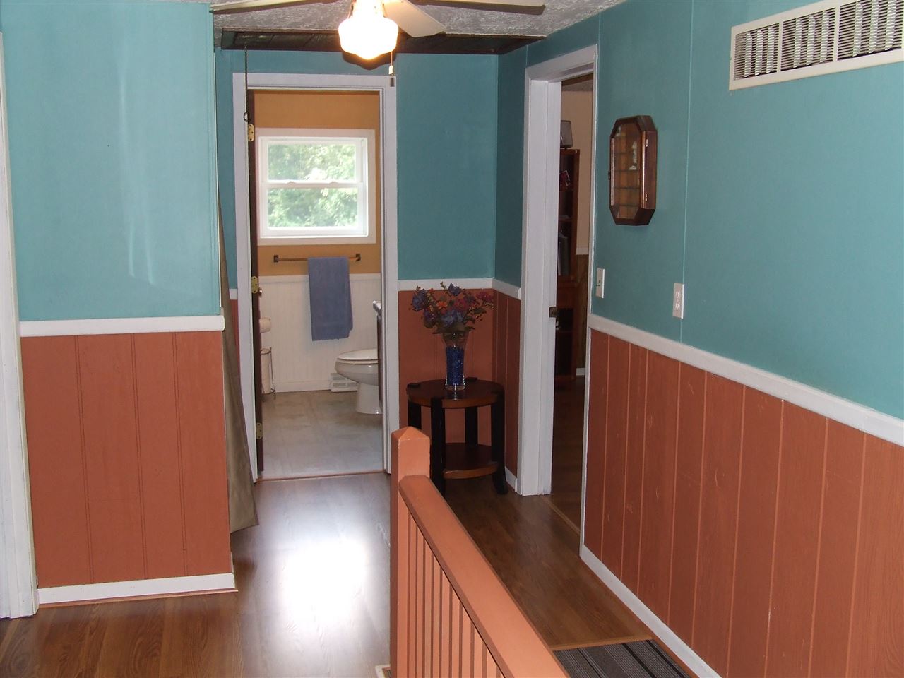 8765 North Lake Road Lena, IL 61048 - Photo 4 of 12 a view of hallway with wooden floor