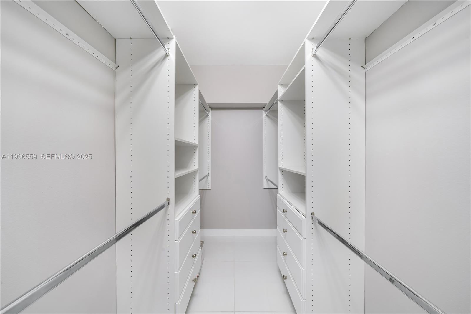 8095 Northwest 8th Street, Unit 412 Miami, FL 33126 - Photo 16 of 20 a bathroom with a bathtub and shower