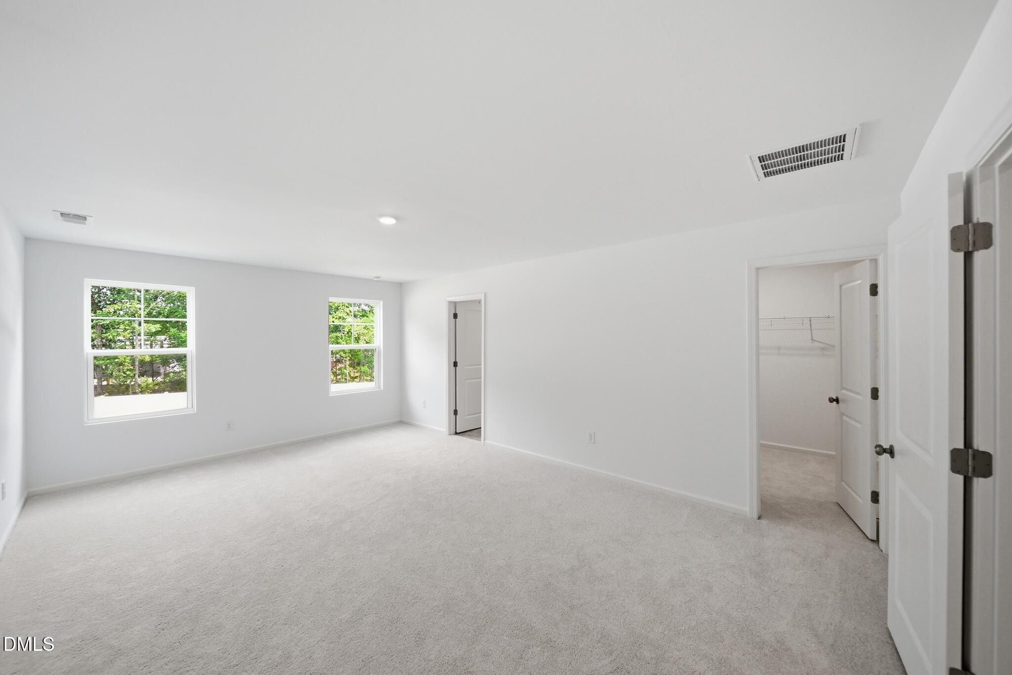 216 Tree Moss Court Rolesville, NC 27571 - Photo 17 of 31 22_216_Tree_Moss_Ct-Bedroom-2140