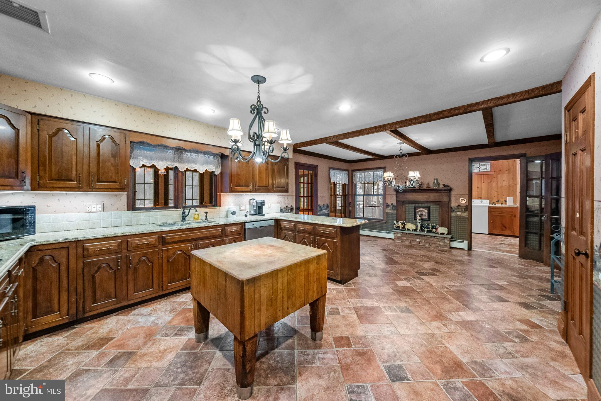 402 Main Street Manalapan, NJ 07726 - Photo 13 of 44 Spacious kitchen with rustic charm.