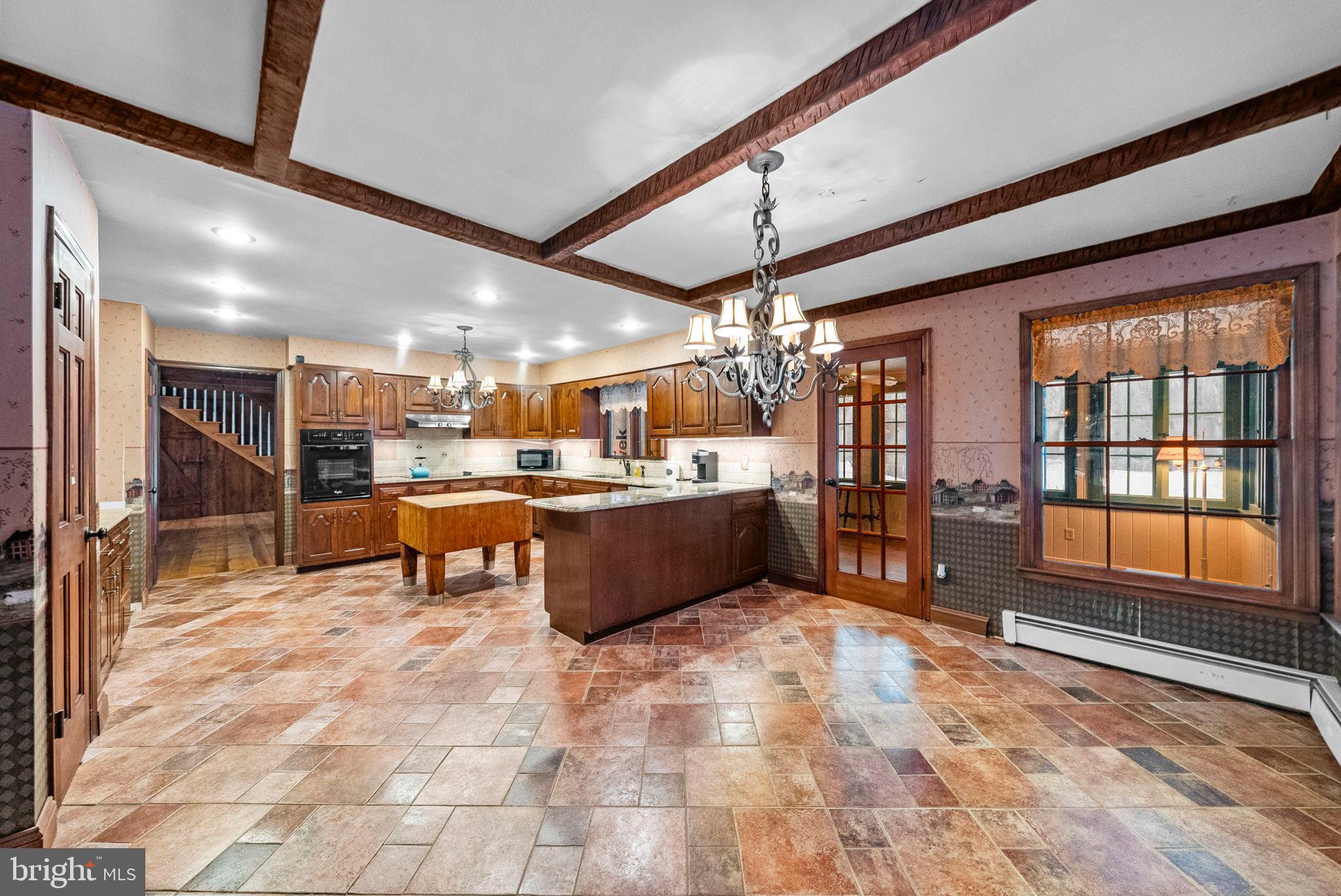 402 Main Street Manalapan, NJ 07726 - Photo 15 of 44 Spacious kitchen with elegant finishes.