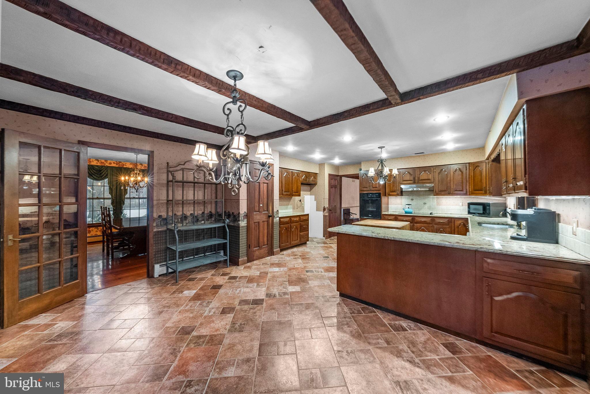 402 Main Street Manalapan, NJ 07726 - Photo 16 of 44 Spacious kitchen with rustic charm.
