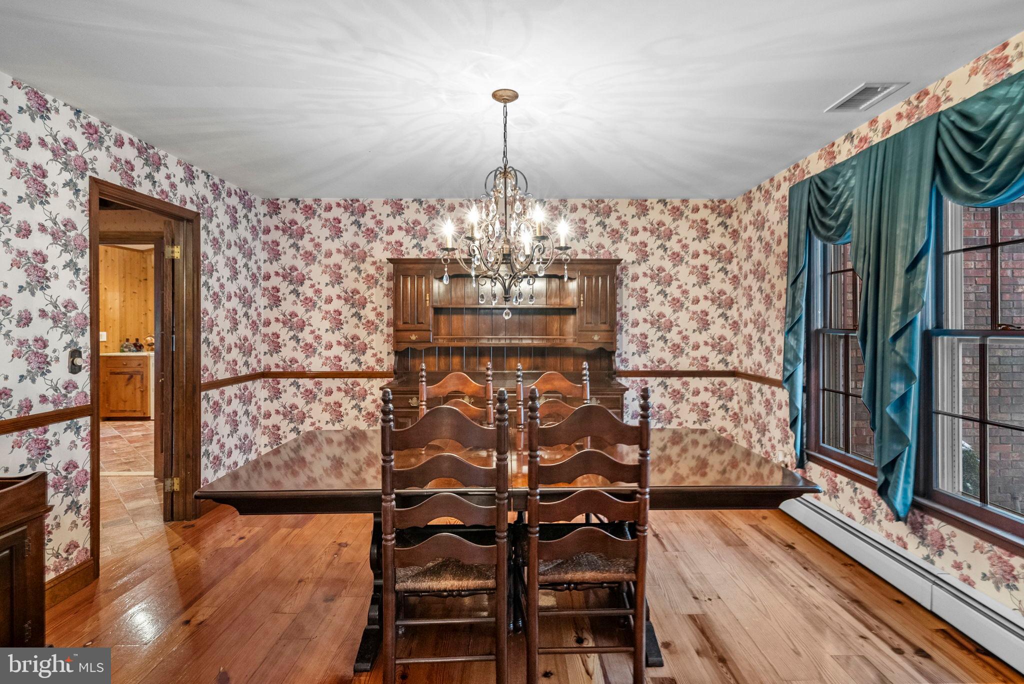 402 Main Street Manalapan, NJ 07726 - Photo 17 of 44 Charming dining space with floral accents.