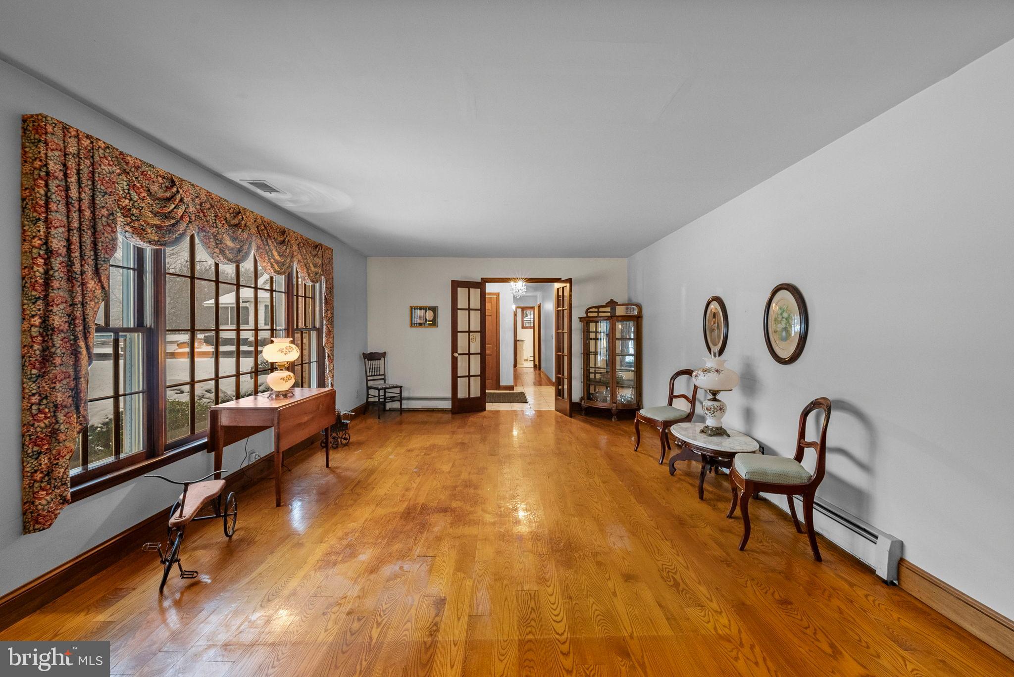 402 Main Street Manalapan, NJ 07726 - Photo 19 of 44 Spacious room with elegant natural light.