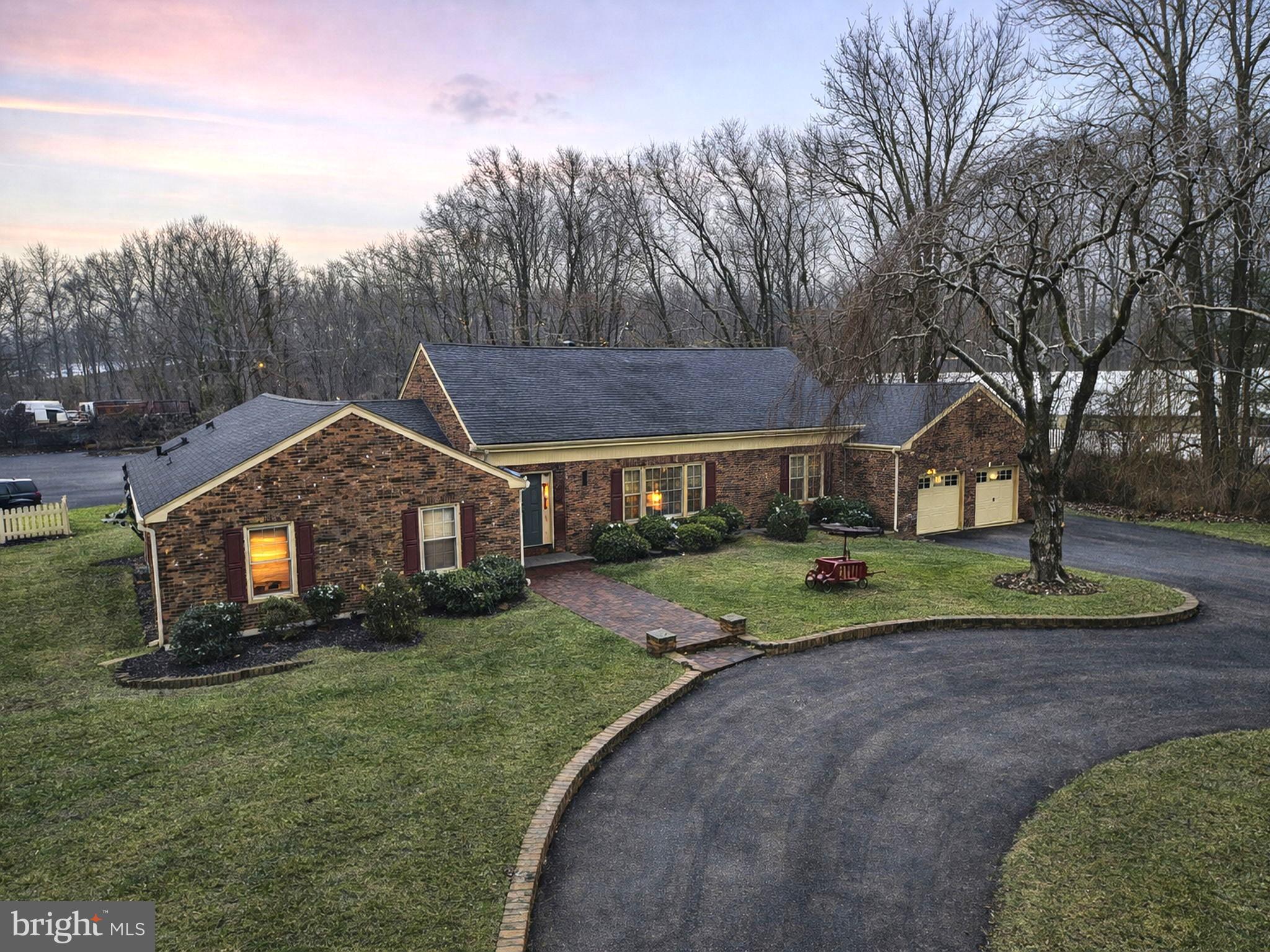 402 Main Street Manalapan, NJ 07726 - Photo 2 of 44 Charming brick home nestled in serene nature.