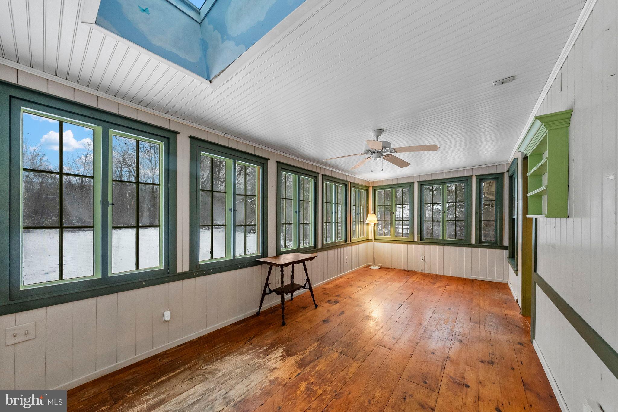 402 Main Street Manalapan, NJ 07726 - Photo 22 of 44 Bright sunroom with panoramic views.