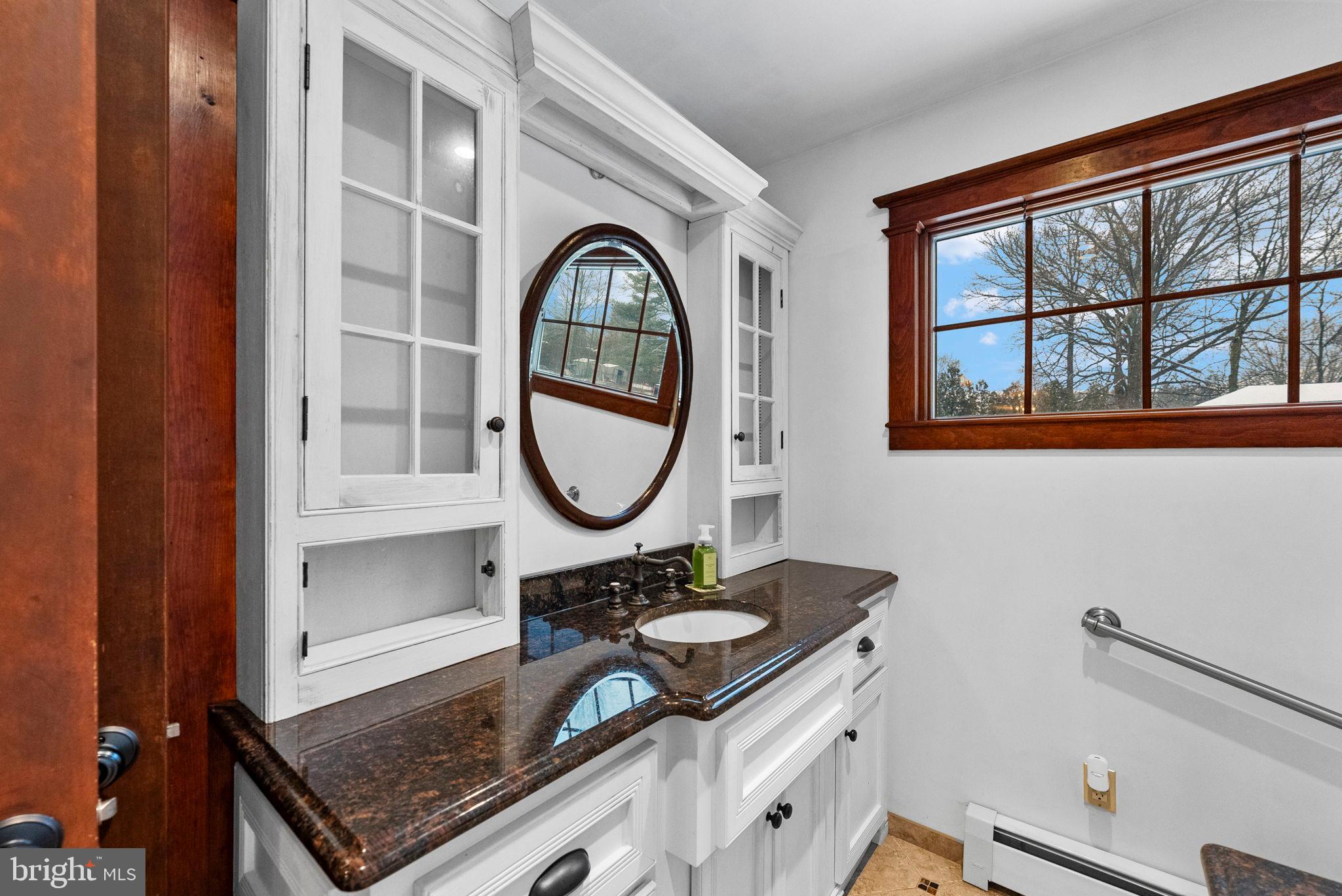 402 Main Street Manalapan, NJ 07726 - Photo 25 of 44 Elegant bathroom with classic charm.