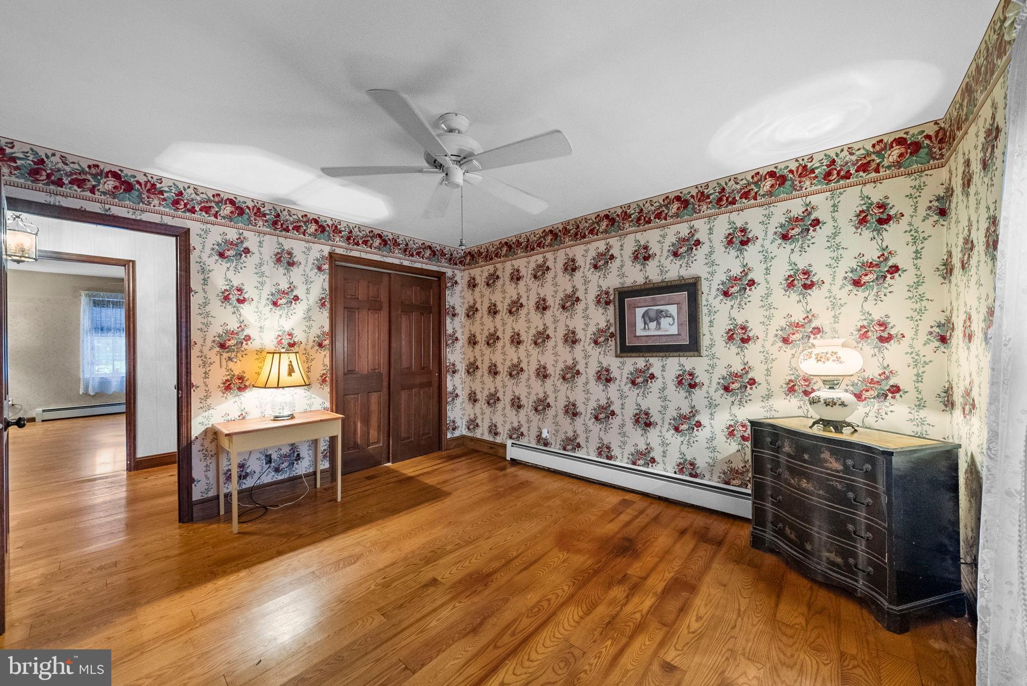 402 Main Street Manalapan, NJ 07726 - Photo 32 of 44 Charming vintage room with floral wallpaper.