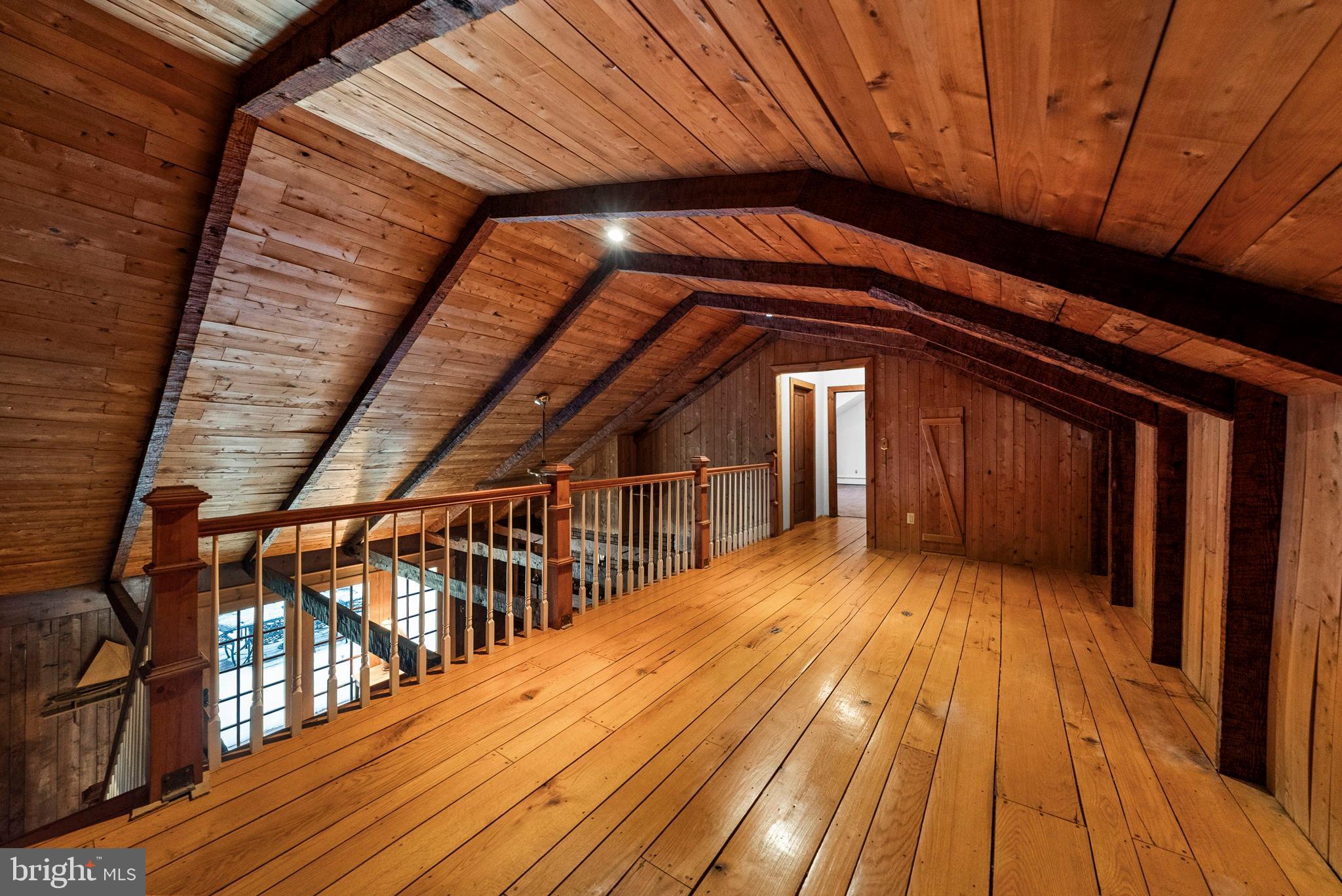 402 Main Street Manalapan, NJ 07726 - Photo 36 of 44 Charming wooden loft with rustic appeal.