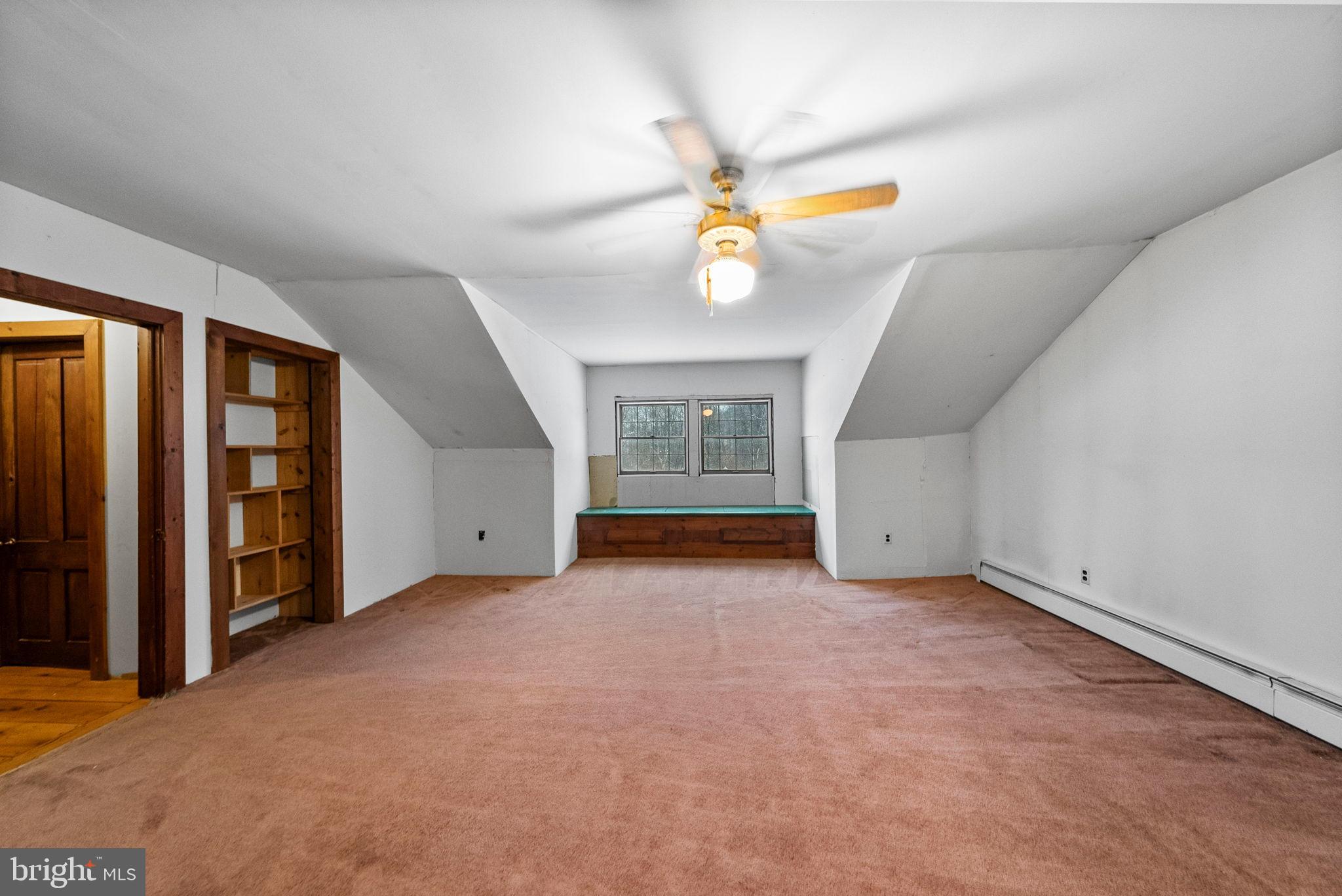 402 Main Street Manalapan, NJ 07726 - Photo 41 of 44 Spacious attic retreat with natural light.
