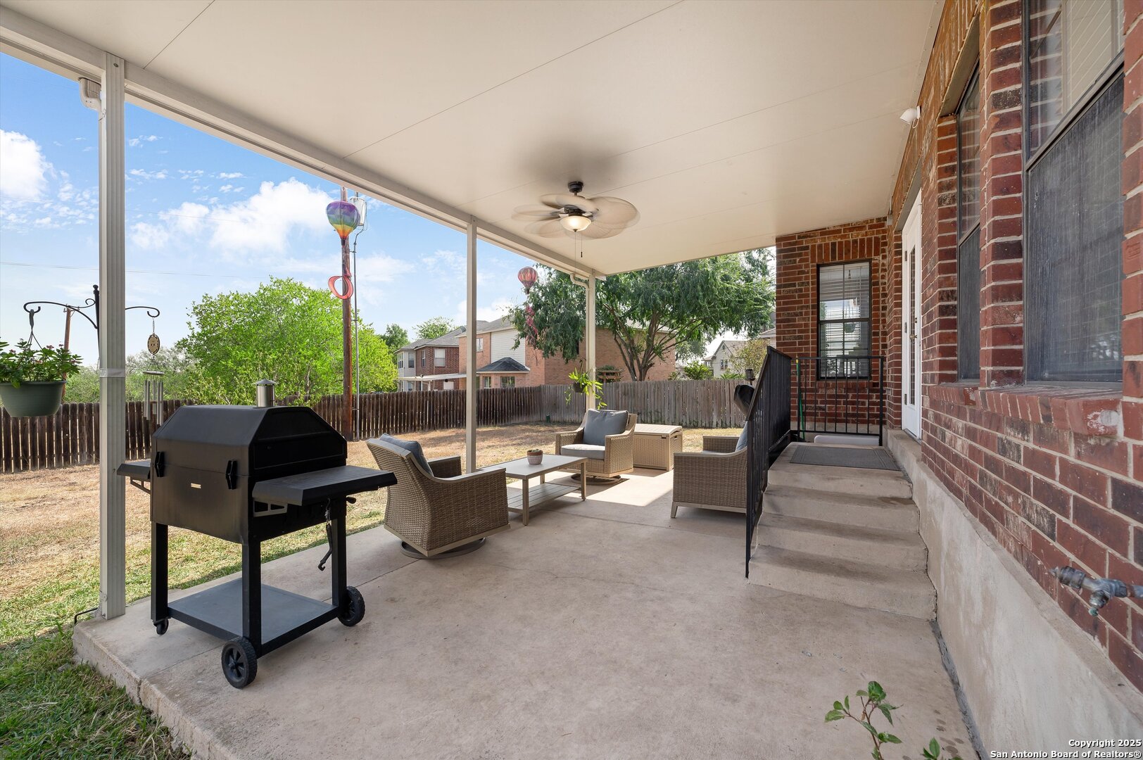 7624 Lonecrest Lane Converse, TX 78109 - Photo 29 of 32 a living room with furniture and a large window