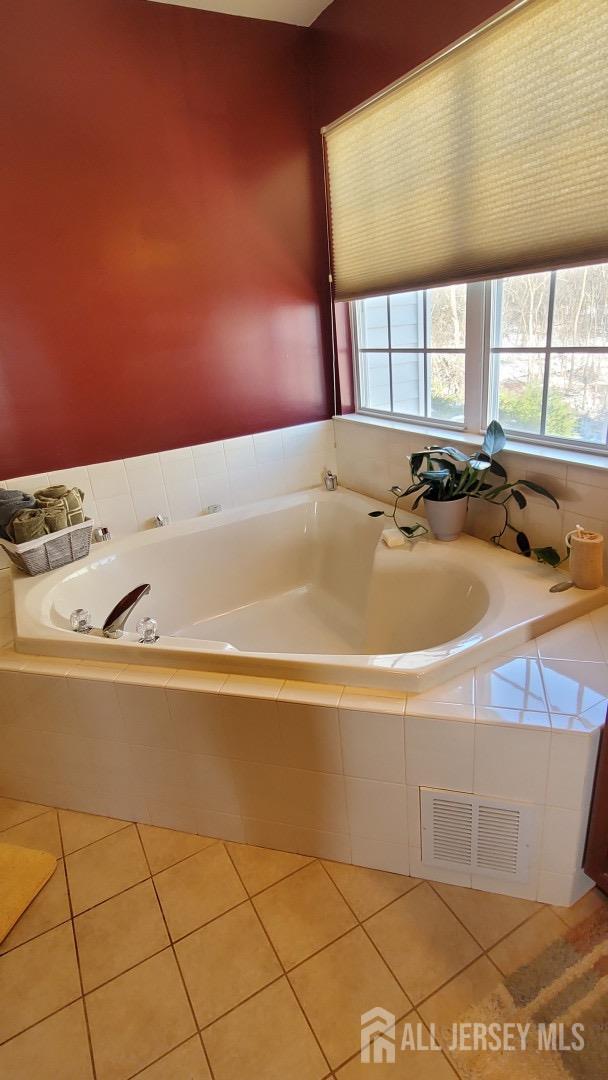 14 Young Way Bridgewater, NJ 08807 - Photo 28 of 38 a bathroom with a bathtub