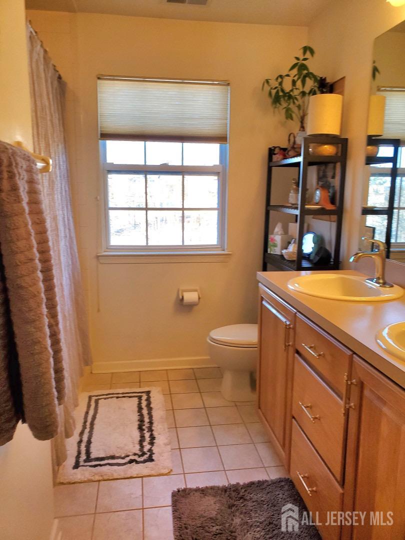14 Young Way Bridgewater, NJ 08807 - Photo 33 of 38 a room with a sink and a window