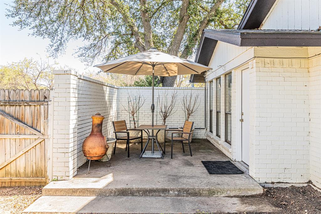 18 Crosslands Road Benbrook, TX 76132 - Photo 27 of 39 Private patio off primary bedroom