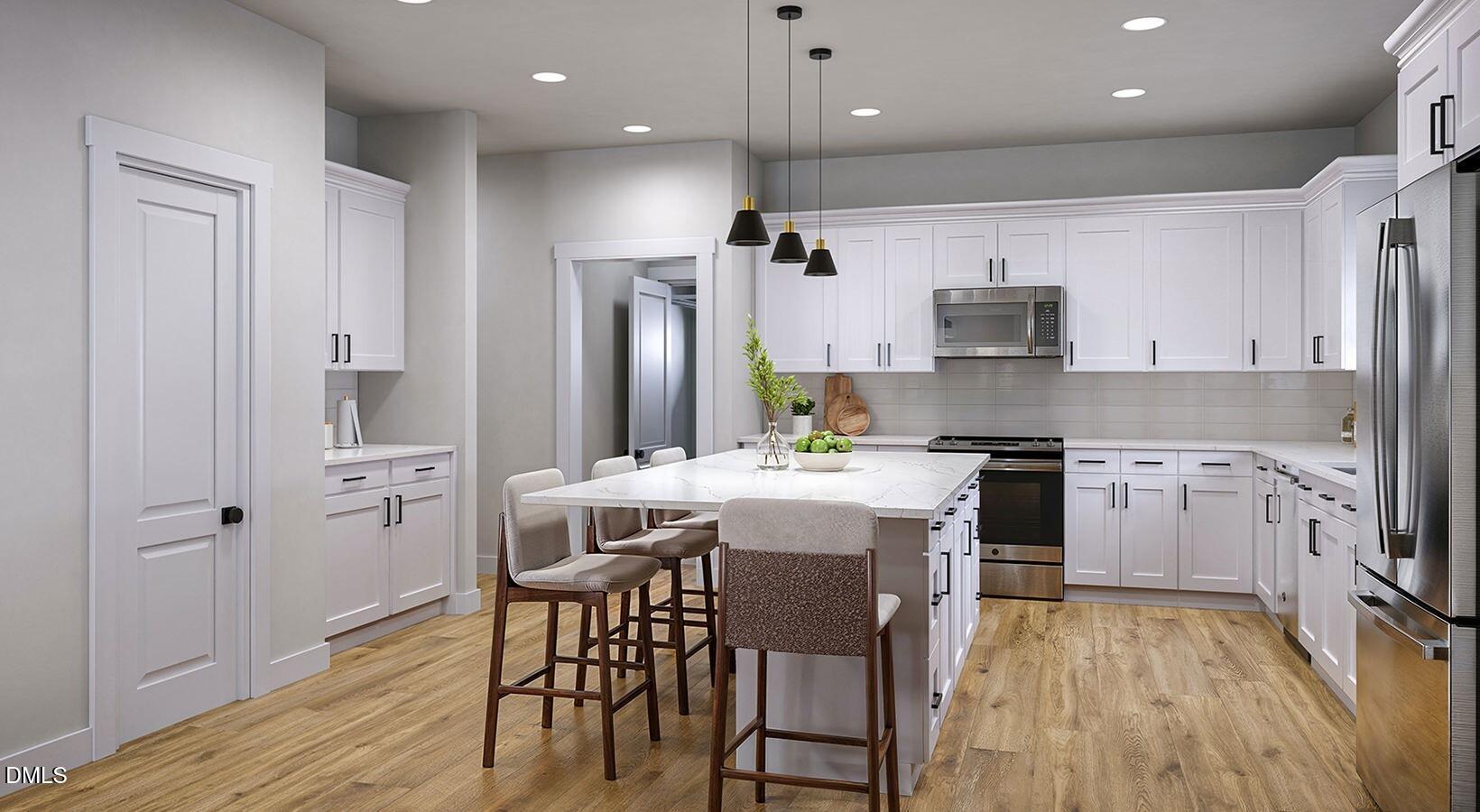 145 Burke Legacy Way, Unit ROWAN Wendell, NC 27591 - Photo 4 of 12 kitchen-2-dbf49186aa2a17ca968dd3e42098f7