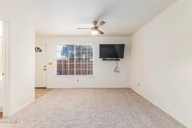 a view of a kitchen with marble top and cabinet