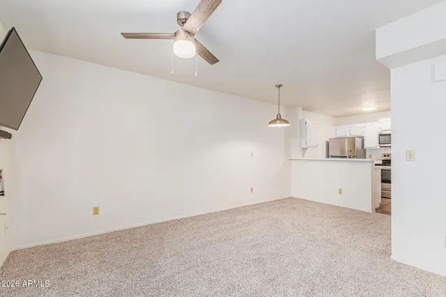 a view of a kitchen with a sink