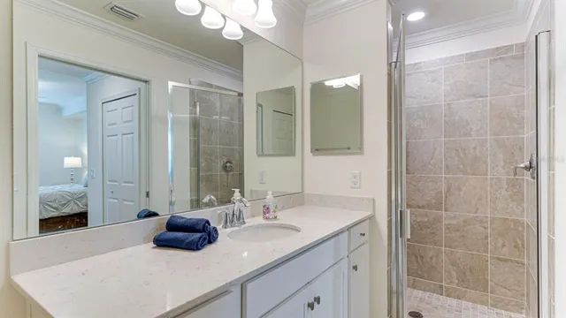 a bathroom with a double vanity sink and a mirror