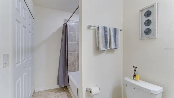a bathroom with a toilet and a sink
