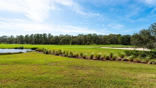 a view of a building with a yard