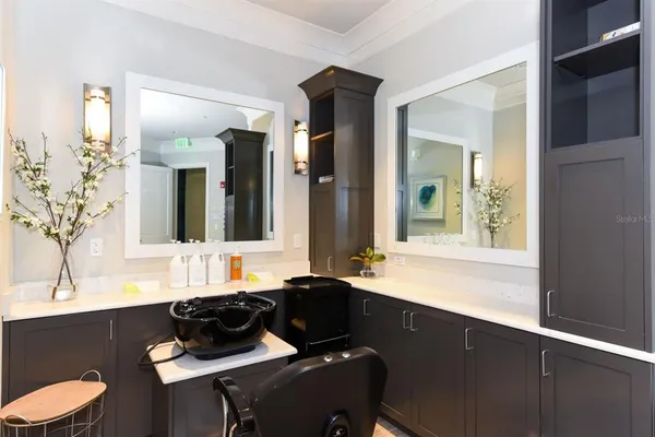 a bath room with a bed and a table