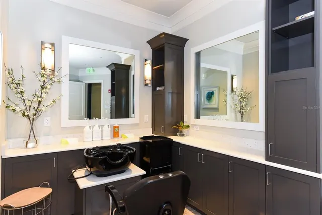 a bath room with a bed and a table