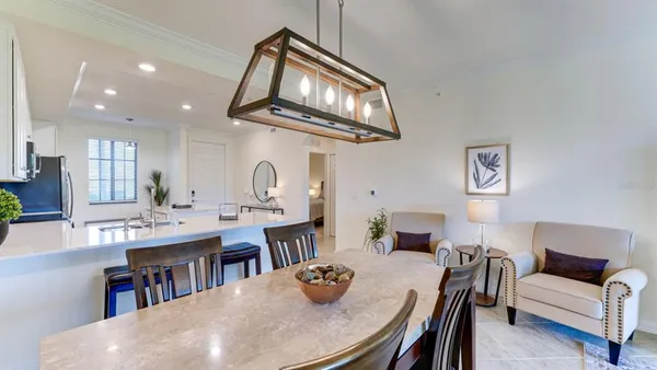 a living room with furniture and a table